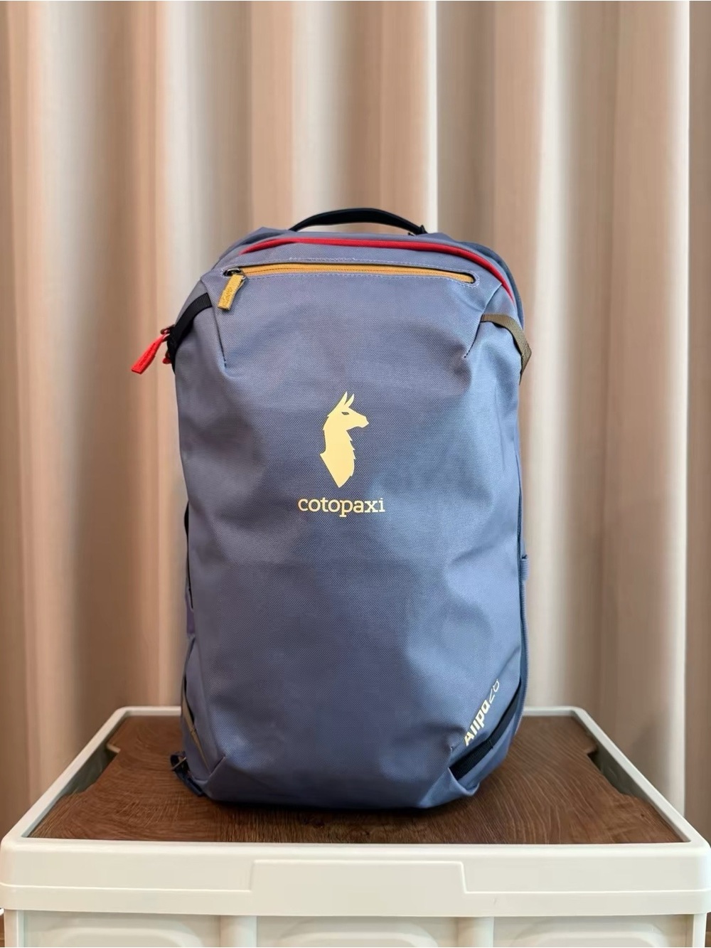 cotopaxi Blue Backpack with Yellow Accents